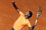 ROME, ITALY - MAY 21:  Rafael Nadal of Spain serves to Novak Djokovic of Serbia in the final during day ten of the Internazionali BNL d'Italia 2012 Tennis on May 21, 2012 in Rome, Italy.  (Photo by Julian Finney/Getty Images)