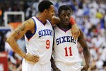 PHILADELPHIA, PA - MAY 18: Andre Iguodala #9 and Jrue Holiday #11 of the Philadelphia 76ers talk at the end of the game against the Boston Celtics in Game Four of the Eastern Conference Semifinals in the 2012 NBA Playoffs at the Wells Fargo Center on May 18, 2012 in Philadelphia, Pennsylvania. The Sixers won 92-83. NOTE TO USER: User expressly acknowledges and agrees that, by downloading and or using this photograph, User is consenting to the terms and conditions of the Getty Images License Agreement. (Photo by Drew Hallowell/Getty Images)