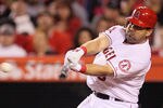ANAHEIM, CA - APRIL 30:  Kendrys Morales #8 of the Los Angeles Angels of Anaheim hits a single against the Minnesota Twins in the sixth inning at Angel Stadium of Anaheim on April 30, 2012 in Anaheim, California. The Angels defeated the Twins 4-3.  (Photo by Jeff Gross/Getty Images)