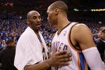 OKLAHOMA CITY, OK - MAY 21:  (L-R) Kobe Bryant #24 of the Los Angeles Lakers talks with Russell Westbrook #0 of the Oklahoma City Thunder after a 106-90 loss during Game Five of the Western Conference Semifinals of the 2012 NBA Playoffs at Chesapeake Energy Arena on May 21, 2012 in Oklahoma City, Oklahoma. The Oklahoma City Thunder win the series 4-1, and advance to the Western Conference Finals.  NOTE TO USER: User expressly acknowledges and agrees that, by downloading and or using this photograph, User is consenting to the terms and conditions of the Getty Images License Agreement.  (Photo by Ronald Martinez/Getty Images)