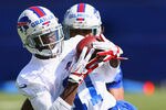 ORCHARD PARK, NY - MAY 11:  T.J. Graham #11 of  the Buffalo Bills  makes a catch during  Buffalo Bills Rookie Camp on May 11, 2012 in Orchard Park, New York.  (Photo by Rick Stewart/Getty Images)
