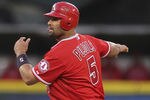 SEATTLE, WA - MAY 24:  Albert Pujols #5 of the Los Angeles Angels of Anaheim steals second base in the sixth inning against the Seattle Mariners at Safeco Field on May 24, 2012 in Seattle, Washington. (Photo by Otto Greule Jr/Getty Images)