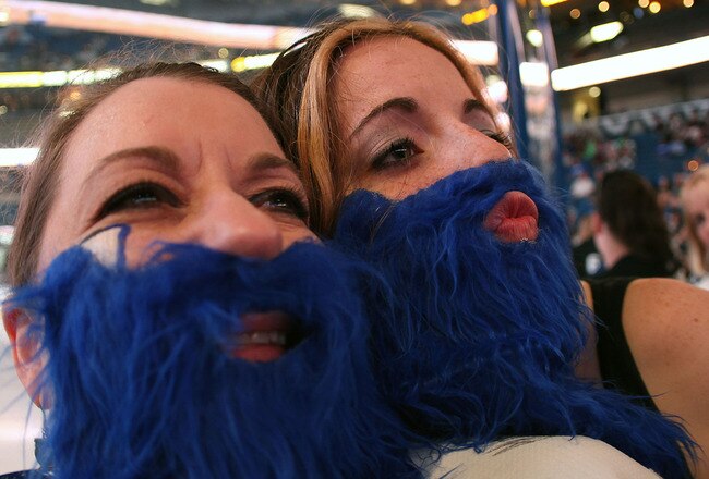 TAMPA, FL - APRIL 18: Tampa Bay Lightning fans wearing blue beards lend their support for their team against the Pittsburgh Penguins in Game Three of the Eastern Conference Quarterfinals during the 2011 NHL Stanley Cup Playoffs at the St. Pete Times Forum on April 18, 2011 in Tampa, Florida. (Photo by Eliot J. Schechter/Getty Images)