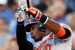KANSAS CITY, MO - MAY 16:  Adam Jones #10 of the Baltimore Orioles bats during the game against the Kansas City Royals at Kauffman Stadium on May 16, 2012 in Kansas City, Missouri.  (Photo by Jamie Squire/Getty Images)
