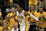INDIANAPOLIS, IN - MAY 17: Danny Granger #33 of the Indiana Pacers celebrates a shot against the Miami Heat in Game Three of the Eastern Conference Semifinals in the 2012 NBA Playoffs at Bankers Life Fieldhouse on May 17, 2012 in Indianapolis, Indiana. The Pacers defeated the Heat 94-75. NOTE TO USER: User expressly acknowledges and agrees that, by downloading and/or using this photograph, User is consenting to the terms and conditions of the Getty Images License Agreement. (Photo by Jonathan Daniel/Getty Images)