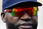 BALTIMORE, MD - MAY 22: David Ortiz #34 of the Boston Red Sox talks with a teammate while waiting to take batting practice before the start of the Red Sox and Baltimore Orioles game at Oriole Park at Camden Yards on May 22, 2012 in Baltimore, Maryland.  (Photo by Rob Carr/Getty Images)