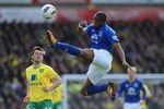 NORWICH, ENGLAND - APRIL 07:  Silvain Distin of Everton clears under pressure from Jonny Howson of Norwich during the Barclays Premier League match between Norwich City and Everton at Carrow Road on April 7, 2012 in Norwich, England.  (Photo by Mike Hewitt/Getty Images)