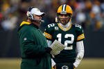 GREEN BAY, WI - JANUARY 15:  Head coach Mike McCarthy of the Green Bay Packers talks with  Aaron Rodgers #12 on the sidelines against the New York Giants during their NFC Divisional playoff game at Lambeau Field on January 15, 2012 in Green Bay, Wisconsin.  (Photo by Scott Boehm/Getty Images)