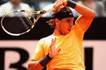 ROME, ITALY - MAY 21:  Rafael Nadal of Spain in action against Novak Djokovic of Serbia in their final match during day ten of the Internazionali BNL d'Italia 2012 at the Foro Italico Tennis Centre on May 21, 2012 in Rome, Italy.  (Photo by Clive Brunskill/Getty Images)