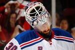 NEWARK, NJ - MAY 25:  Henrik Lundqvist #30 of the New York Rangers looks on after losing Game Six of the Eastern Conference Final during the 2012 NHL Stanley Cup Playoffs to the New Jersey Devils by a score of 3-2 at the Prudential Center on May 25, 2012 in Newark, New Jersey.  (Photo by Bruce Bennett/Getty Images)