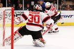 NEW YORK, NY - MAY 23:  Martin Brodeur #30 of the New Jersey Devils defends against the New York Rangers in Game Five of the Eastern Conference Final during the 2012 NHL Stanley Cup Playoffs at Madison Square Garden on May 23, 2012 in New York City.  (Photo by Bruce Bennett/Getty Images)