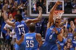 DALLAS, TX - MAY 05:  (L-R) James Harden #13, Kevin Durant #35 and Russell Westbrook #0 of the Oklahoma City Thunder celebrate after scoring with 10 seconds against the Dallas Mavericks during Game Four of the Western Conference Quarterfinals in the 2012 NBA Playoffs at American Airlines Center on May 5, 2012 in Dallas, Texas. NOTE TO USER: User expressly acknowledges and agrees that, by downloading and or using this photograph, User is consenting to the terms and conditions of the Getty Images License Agreement.  (Photo by Ronald Martinez/Getty Images)