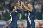RUSTENBURG, SOUTH AFRICA - JUNE 12:  Clint Dempsey (R) and Landon Donovan of the United States celebrate at the final whistle during the 2010 FIFA World Cup South Africa Group C match between England and USA at the Royal Bafokeng Stadium on June 12, 2010 in Rustenburg, South Africa.  (Photo by Kevork Djansezian/Getty Images)