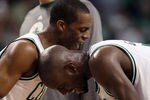 BOSTON, MA - MAY 12: Kevin Garnett #5 and Rajon Rondo #9 of the Boston Celtics celebrate Garnett's basket as they head into a time out against the Philadelphia 76ers in Game One of the Eastern Conference Semifinals in the 2012 NBA Playoffs on May 12, 2012 at TD Garden in Boston, Massachusetts. The Boston Celtics defeated the Philadelphia 76ers 92-91. NOTE TO USER: User expressly acknowledges and agrees that, by downloading and or using this photograph, User is consenting to the terms and conditions of the Getty Images License Agreement.  (Photo by Elsa/Getty Images)