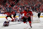 NEWARK, NJ - MAY 25:  Adam Henrique #14 of the New Jersey Devils celerbates after scoring the game winning goal in overtime against Henrik Lundqvist #30 of the New York Rangers to win Game Six of the Eastern Conference Final and advance to the 2012 NHL Stanley Cup Final at the Prudential Center on May 25, 2012 in Newark, New Jersey.  (Photo by Bruce Bennett/Getty Images)