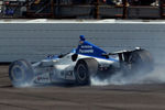 INDIANAPOLIS, IN - MAY 27:  Debris falls off of the #15 Rahal Letterman Lanigan Racing Honda driven by Takuma Sato as he hits the wall and wrecks on the final lap while challenging for the potential win during the IZOD IndyCar Series 96th running of the Indianpolis 500 mile race at the Indianapolis Motor Speedway on May 27, 2012 in Indianapolis, Indiana.  (Photo by Nick Laham/Getty Images)