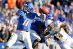 BOISE, ID - NOVEMBER 26:  Kellen Moore #11 of the Boise State Broncos passes against the Wyoming Cowboys at Bronco Stadium on November 26, 2011 in Boise, Idaho.  (Photo by Otto Kitsinger III/Getty Images)