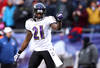 FOXBORO, MA - JANUARY 22:  Lardarius Webb #21 of the Baltimore Ravens reacts after a play against the New England Patriots during their AFC Championship Game at Gillette Stadium on January 22, 2012 in Foxboro, Massachusetts.  (Photo by Elsa/Getty Images)