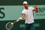 PARIS, FRANCE - MAY 27:  Novak Djokovic of Serbia plays a backhand during a practice session on day one of the French Open at Roland Garros on May 27, 2012 in Paris, France.  (Photo by Getty Images/Getty Images)