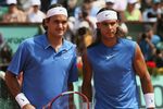 PARIS - JUNE 11:  Rafael Nadal (R) of Spain poses with Roger Federer of Switzerland ahead of the Men's Singles Final on day fifteen of the French Open at Roland Garros on June 11, 2006 in Paris, France.  (Photo by Clive Brunskill/Getty Images)
