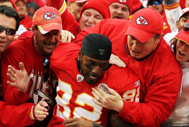 KANSAS CITY, MO - DECEMBER 18:  Dwayne Bowe #82 of the Kansas City Chiefs celebrates by jumping into the standfs after the Chiefs defeated the Green Bay Packers 19-14 to win the game on December 18, 2011 at Arrowhead Stadium in Kansas City, Missouri.  (Photo by Jamie Squire/Getty Images)
