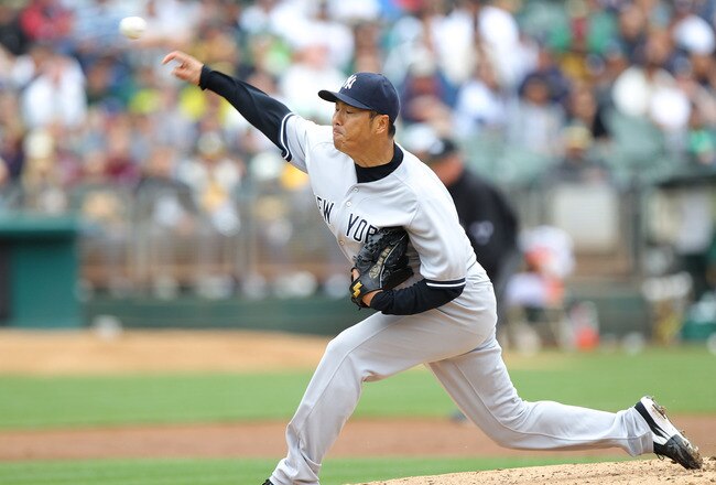 OAKLAND, CA - MAY 27:  Hiroki Kuroda #18 of the New York Yankees pitches against the Oakland Athletics at O.co Coliseum on May 27, 2012 in Oakland, California.  (Photo by Jed Jacobsohn/Getty Images)