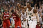 BOSTON, MA - MAY 26:  Rajon Rondo #9 of the Boston Celtics reacts after scoring against the Philadelphia 76ers, in Game Seven of the Eastern Conference Semifinals during the 2012 NBA Playoffs on May 26, 2012 at TD Garden in Boston, Massachusetts. NOTE TO USER: User expressly acknowledges and agrees that, by downloading and or using this photograph, User is consenting to the terms and conditions of the Getty Images License Agreement. The Celtics won 85-75. (Photo by Jim Rogash/Getty Images)