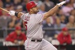SEATTLE, WA - MAY 25:  Albert Pujols #5 of the Los Angeles Angels of Anaheim watches his two-run home run in the sixth inning against the Seattle Mariners at Safeco Field on May 25, 2012 in Seattle, Washington. (Photo by Otto Greule Jr/Getty Images)