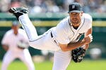 DETROIT, MI - APRIL 05:  Justin Verlander #35 of the Detroit Tigers pitches in the sixth inning on opening day against the Boston Red Sox at Comerica Park on April 5, 2012 in Detroit, Michigan. The Tigers defeated the Red Sox 3-2. (Photo by Leon Halip/Getty Images)