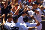 NEW YORK, NY - MAY 20:  Raul Ibanez #27 of the New York Yankees celebrates his two run home run against the Cincinnati Reds during their game on May 20, 2012 at Yankee Stadium in the Bronx borough of New York City.  (Photo by Al Bello/Getty Images)
