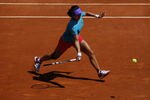 PARIS, FRANCE - MAY 26:  Li Na of China plays a forehand during a practice session ahead of the 2012 French Open at Roland Garros on May 26, 2012 in Paris, France.  (Photo by Dan Istitene/Getty Images)