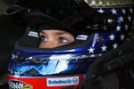 DARLINGTON, SC - MAY 11:  Danica Patrick, driver of the #7 GoDaddy.com Chevrolet, sits in her car in the garage area during practice for the NASCAR Nationwide Series VFW Sport Clips Help a Hero 200 at Darlington Raceway on May 11, 2012 in Darlington, South Carolina.  (Photo by Jamie Squire/Getty Images)
