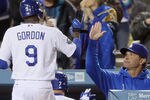 LOS ANGELES, CA - MAY 26:  Dee Gordon #9 of the Los Angeles Dodgers is congratulated by manager Don Mattingly after scoring a run in the fourth inning against the Houston Astros at Dodger Stadium on May 26, 2012 in Los Angeles, California.  (Photo by Jeff Gross/Getty Images)