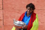 PARIS, FRANCE - JUNE 05:  Champion Rafael Nadal of Spain poses with the trophy following his victory during the men's singles final match between Rafael Nadal of Spain and Roger Federer of Switzerland on day fifteen of the French Open at Roland Garros on June 5, 2011 in Paris, France.  (Photo by Alex Livesey/Getty Images)