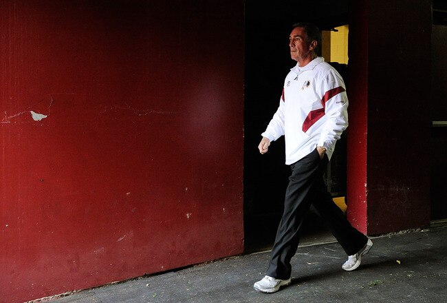 LANDOVER, MD - DECEMBER 04:  Head coach Mike Shanahan of the Washington Redskins walks onto the field prior to a game against the New York Jets at FedExField on December 4, 2011 in Landover, Maryland.  (Photo by Patrick McDermott/Getty Images)