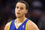 PHOENIX, AZ - FEBRUARY 10:  Stephen Curry #30  the Golden State Warriors reacts during the NBA game against the Phoenix Suns at US Airways Center on February 10, 2011 in Phoenix, Arizona.  The Suns defeated the Warriors 112-88. NOTE TO USER: User expressly acknowledges and agrees that, by downloading and or using this photograph, User is consenting to the terms and conditions of the Getty Images License Agreement.  (Photo by Christian Petersen/Getty Images)