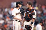 SAN FRANCISCO, CA - APRIL 28:  Buster Posey #28  of the San Francisco Giants talks to Tim Lincecum #55 of the San Francisco Giants during their game against the San Diego Padres at AT&T Park on April 28, 2012 in San Francisco, California.  (Photo by Ezra Shaw/Getty Images)