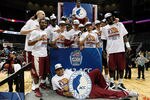 ATLANTA, GA - MARCH 11:  The Florida State Seminoles celebrate after they won 85-82 against the North Carolina Tar Heels during the Final Game of the 2012 ACC Men's Basketball Conference Tournament at Philips Arena on March 11, 2012 in Atlanta, Georgia.  (Photo by Streeter Lecka/Getty Images)