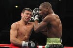 ATLANTIC CITY, NJ - NOVEMBER 20:  Sergio Martinez and Paul Williams exchange punches during their Middleweight Championship fight on November 20, 2010 at The Boardwalk Hall in Atlantic City, New Jersey.  (Photo by Al Bello/Getty Images)