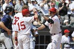 CHICAGO, IL - MAY 27:  Paul Konerko #14 of the Chicago White Sox is congratulated by Gordon Beckham #15 and Adam Dunn #32 after hitting a three run homer against the Cleveland Indians in the fourth inning  on May 27, 2012 at U.S. Cellular Field in Chicago, Illinois.  (Photo by David Banks/Getty Images)