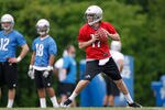 ALLEN PARK, MI - MAY 12: Kellen Moore #17of the Detroit Lions throws a pass during a rookie mini camp  at the Detroit Lions Headquarters and Training Facility on May 12, 2012 in Allen Park, Michigan. (Photo by Gregory Shamus/Getty Images)