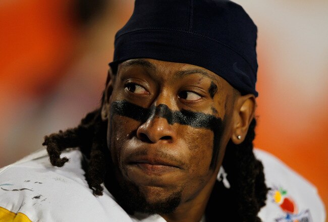 MIAMI GARDENS, FL - JANUARY 04:  Bruce Irvin #11 of the West Virginia Mountaineers looks on against the Clemson Tigers during the Discover Orange Bowl at Sun Life Stadium on January 4, 2012 in Miami Gardens, Florida.  (Photo by Streeter Lecka/Getty Images)