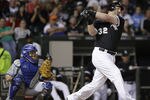 CHICAGO, IL - MAY 11:  Adam Dunn #32 of the Chicago White Sox bats as Humberto Quintero #33 of the Kansas City Royals looks on during their MLB game at U.S. Cellular Field on May 11, 2012 in Chicago, Illinois. The White Sox won the game 5-0. (Photo by John Gress/Getty Images)