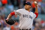 BALTIMORE, MD - MAY 22:  Starting pitcher Felix Doubront #61 of the Boston Red Sox throws to a Baltimore Orioles batter during the first inning at Oriole Park at Camden Yards on May 22, 2012 in Baltimore, Maryland.  (Photo by Rob Carr/Getty Images)