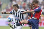TURIN, ITALY - APRIL 21: Domenico Criscito of Genoa (R) competes with Alessandro Del Piero of Juventus during the match between Juventus and Genoa on April 21, 2007 in Turin, Italy. (Photo by New Press/Getty Images)