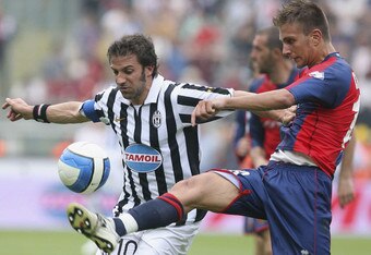 TURIN, ITALY - APRIL 21: Domenico Criscito of Genoa (R) competes with Alessandro Del Piero of Juventus during the match between Juventus and Genoa on April 21, 2007 in Turin, Italy. (Photo by New Press/Getty Images)