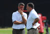 TAMPA, FL -  MAY 4: General manager Mark Dominick and coach Greg Schiano of the Tampa Bay Buccaneers watch a rookie practice at the Buccaneers practice facility May 4, 2012 in Tampa, Florida. (Photo by Al Messerschmidt/Getty Images)