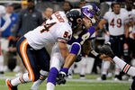 MINNEAPOLIS, MN - JANUARY 1: Brian Urlacher #54 of the Chicago Bears brings down Joe Webb #14 of the Minnesota Vikings during the first quarter on January 1, 2012 at Mall of America Field at the Hubert H. Humphrey Metrodome in Minneapolis, Minnesota. (Photo by Hannah Foslien/Getty Images)