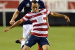 JACKSONVILLE, FL - MAY 26:  Landon Donovan #10 of Team USA, strikes the ball towards the goal against Team Scotland on May 26, 2012 at EverBank Field in Jacksonville, Florida. (Photo by Gary Bogdon/Getty Images)
