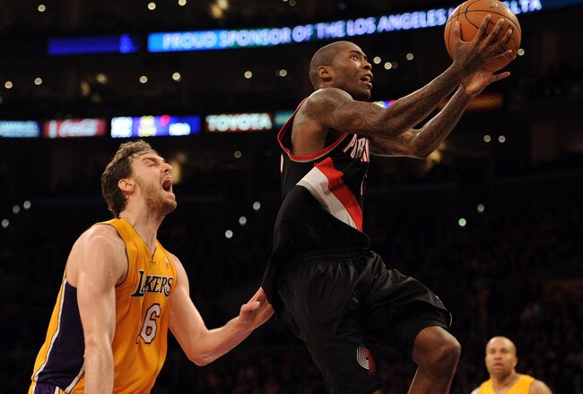 LOS ANGELES, CA - FEBRUARY 20:  Jamal Crawford #11 of the Portland Trail Blazers scores on a layup past Pau Gasol #16 of the Los Angeles Lakers during the second half at Staples Center on February 20, 2012 in Los Angeles, California. The Lakers won 103-92.  NOTE TO USER: User expressly acknowledges and agrees that, by downloading and or using this photograph, User is consenting to the terms and conditions of the Getty Images License Agreement.  (Photo by Harry How/Getty Images)